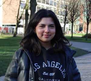 A photo of Bia Hashmi on the University of Manchester campus.