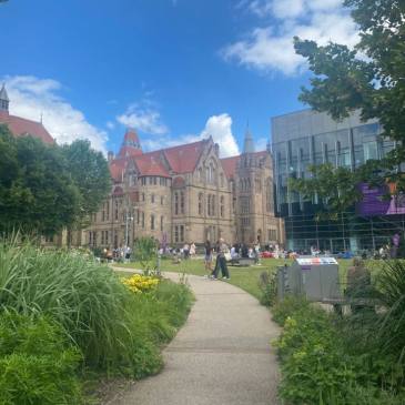 A photo of Alan Gilbert Square on the Manchester campus.