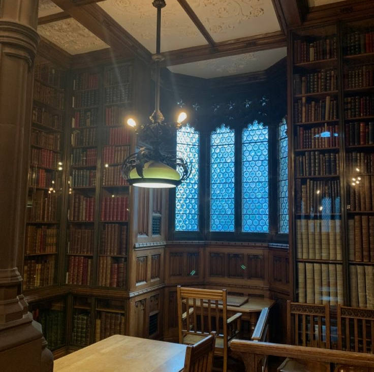 A photo of the inside of a library study space.